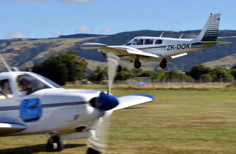 The Piper is seen just before landing.