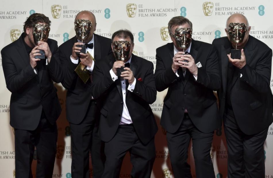 The sound engineers of 'The Revenant' pose after winning the best sound award at the BAFTA Awards...