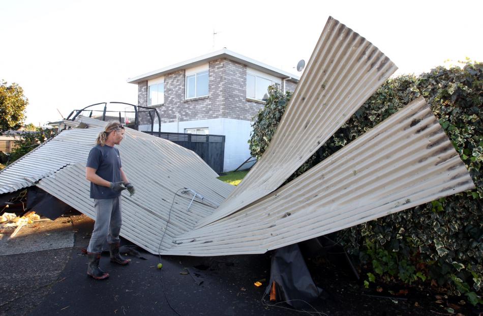 The tornado ripped roofs from houses. Photo: NZ Herald
