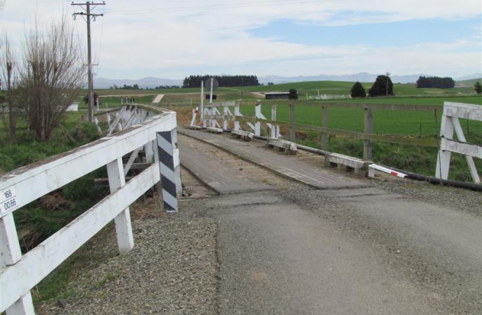 The Waitaki District Council may decide to replace the wooden Slaughter Yard Rd bridge at Enfield...