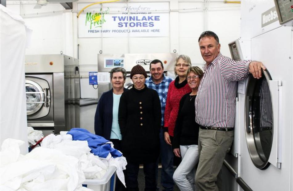 The Waitaki Laundry Services team (from left) Penny Powell, Moana Kairau, Chris Dry, manager Dawn...