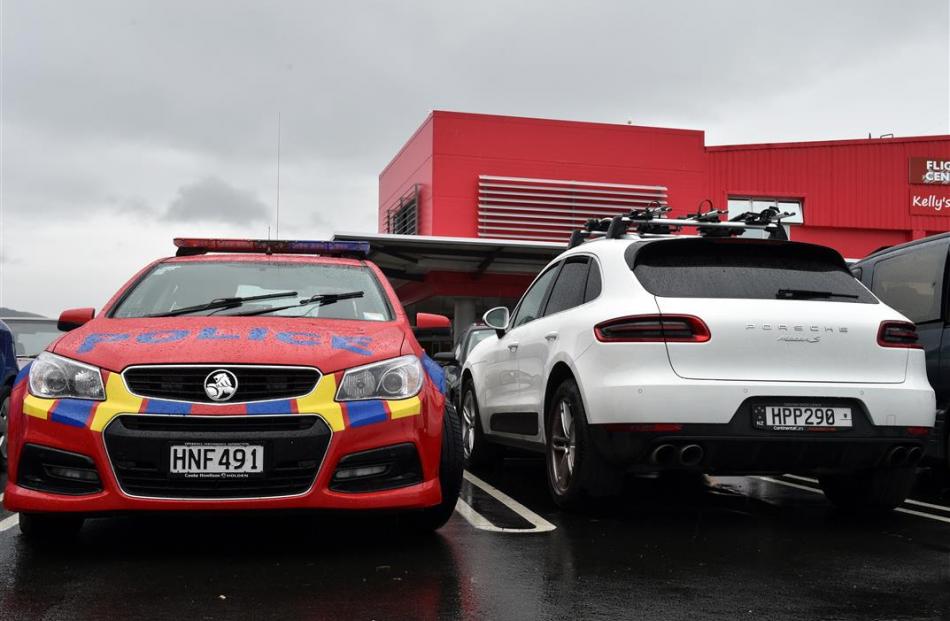 The white 2014 Porsche Macan that was abandoned in a South Dunedin car park. Photo by Gregor...