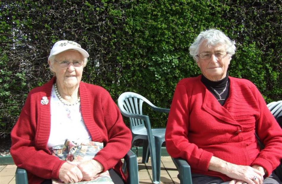 Thelma Mellor (left) and Joan McKenzie, both of Cromwell,  watch the action. Photos by Christina...