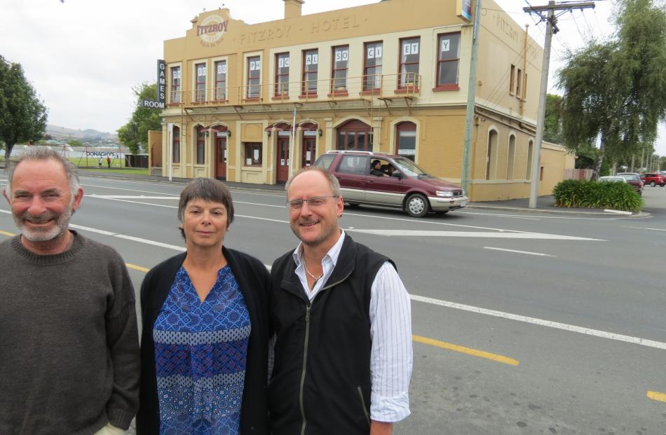 Theosophical society committee member Michael Rudin (left), president Ruth Lawson, and vice...