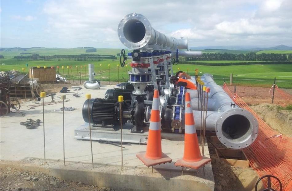 These six pumps with suction and discharge pipes are helping get irrigation water into the...