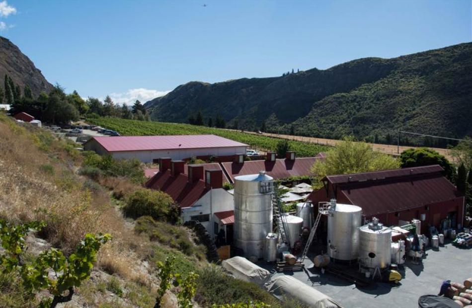 This photograph of Gibbston Valley Winery shows the existing winemaking facility - the barn-like...