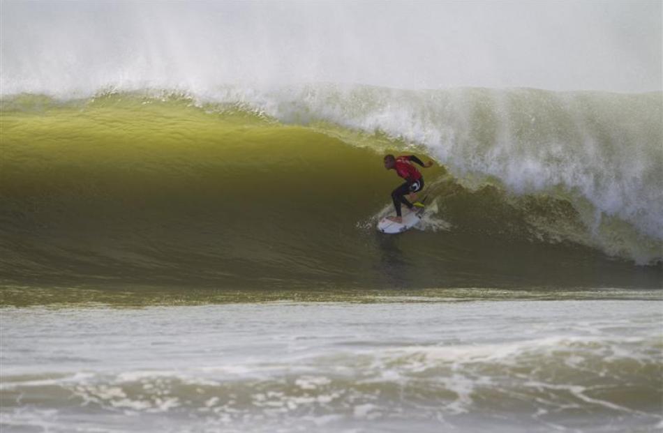 Three times World Surf League champion and current WSL No 1 Mick Fanning surfs at Peniche's...