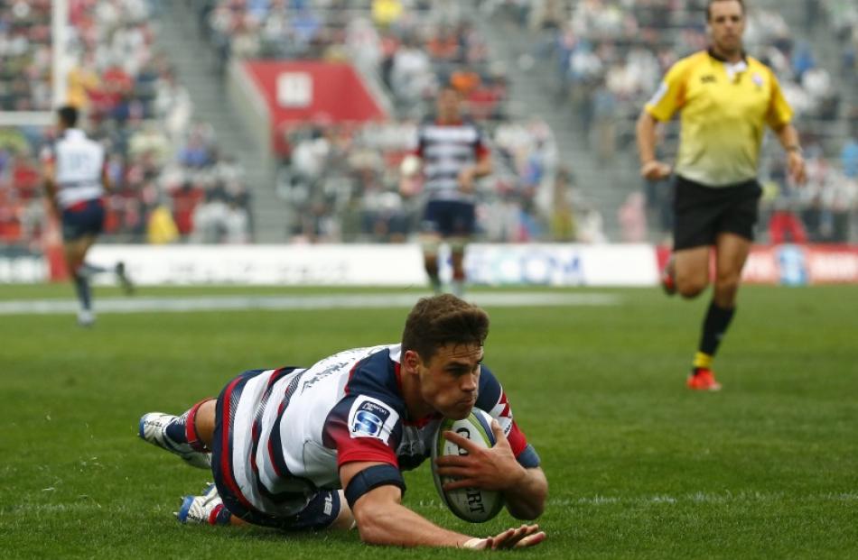 Tom English scores a try for the Rebels. Photo: Reuters