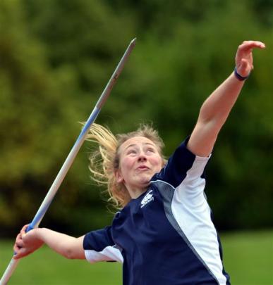 Tori Peeters throws the javelin 50.11m, winning the women's 20-34 years event. Photos by Peter...