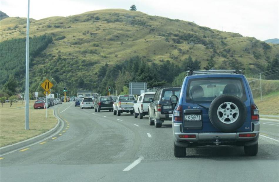 Traffic is often reduced to a crawl during peak times  on  Kawarau Rd at Frankton. Photo by James...