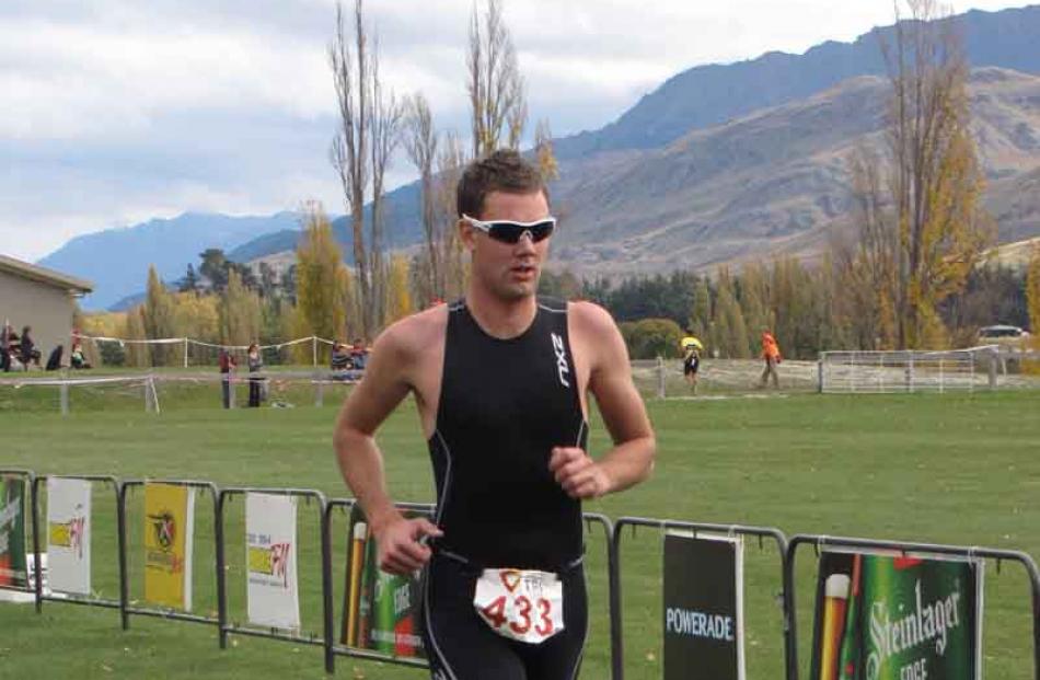 Triathlete Matt King/Keane on his way to winning the 2011 Salomon Series Lake Hayes Easter...