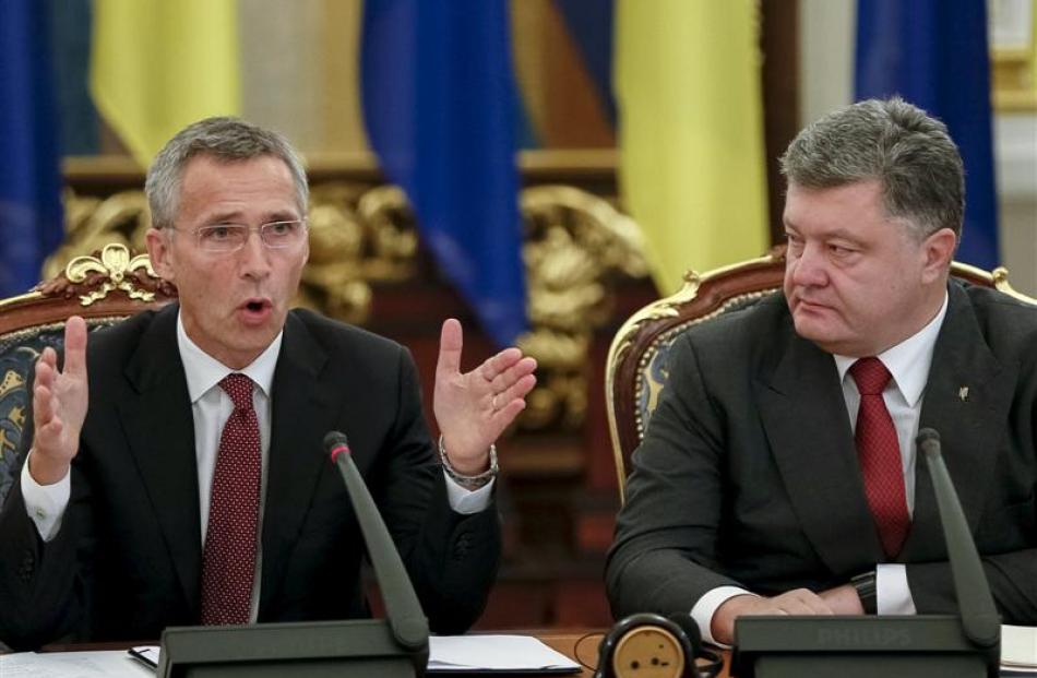 Ukraine President Petro Poroshenko (right) and Nato Secretary-general Jens Stoltenberg attend the...