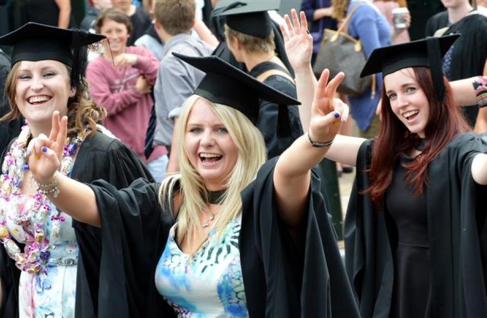 University of Otago graduands (from left) Kyra Dawson (23), Livi Geddes (22) and Chauntelle Marr ...