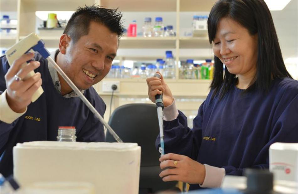 University of Otago postdoctoral research fellow Dr Htin Lin Aung (left) and  visiting medical...