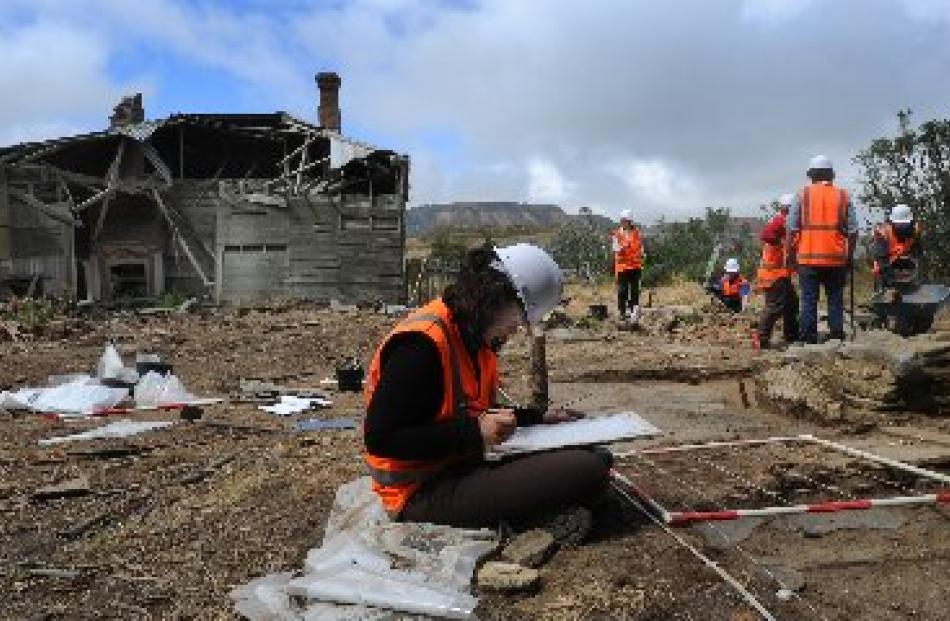 University of Otago student Megan Hickey maps the site of the Robinson farmstead complex at...