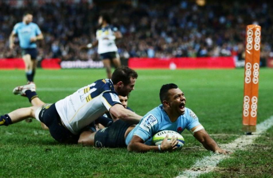 urtley Beale of the Waratahs celebrates scoring a try during the Super Rugby Semi Final match...