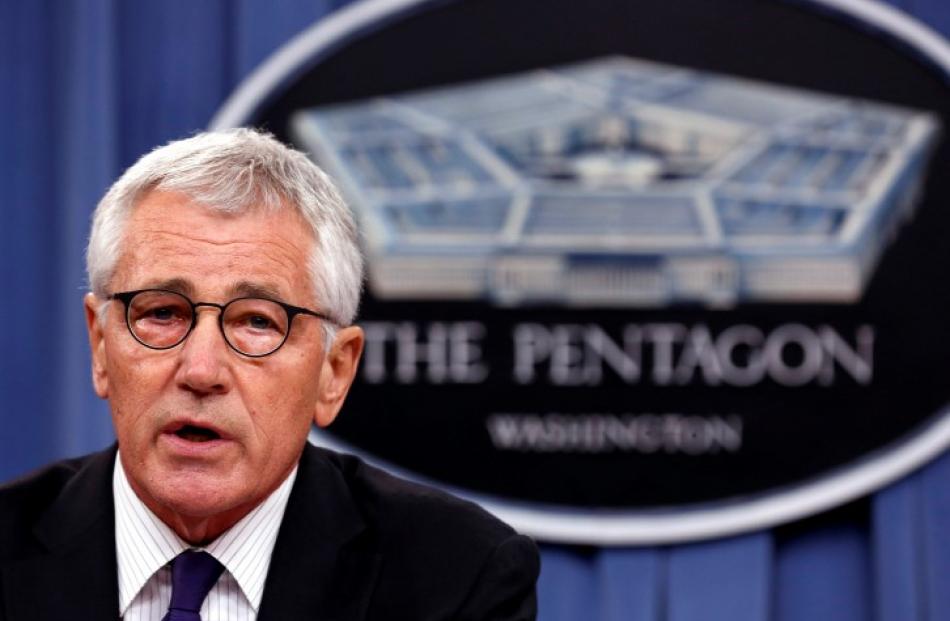 US Secretary of Defense Chuck Hagel speaks about Islamic State at a press briefing at the...