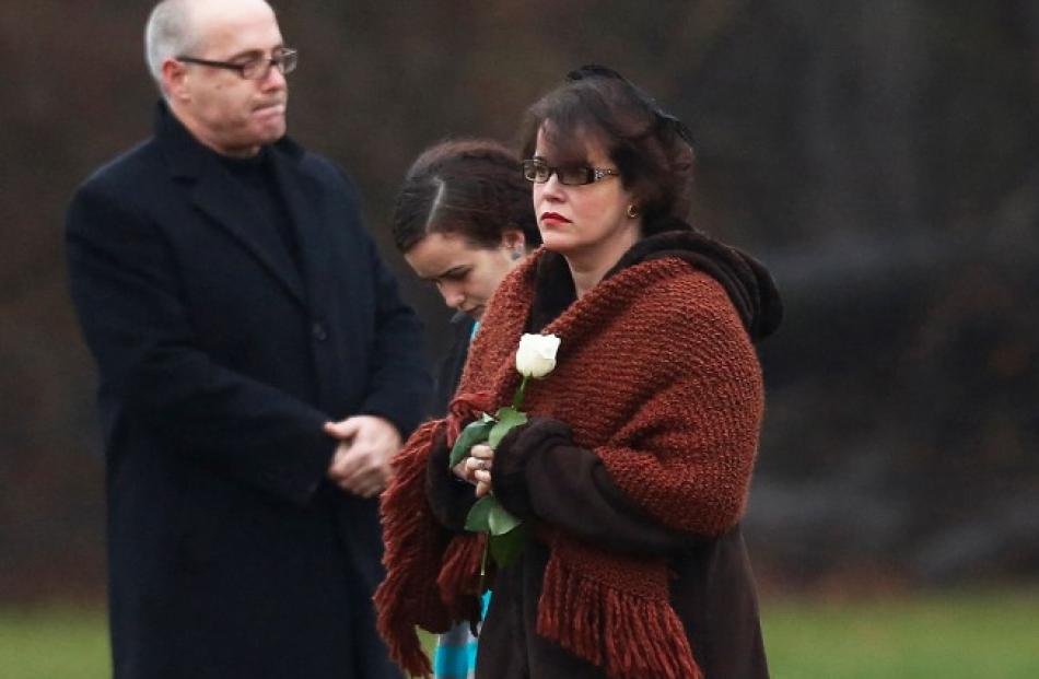 Veronique Pozner, mother of Sandy Hook Elementary school shootings victim Noah Pozner, holds a...