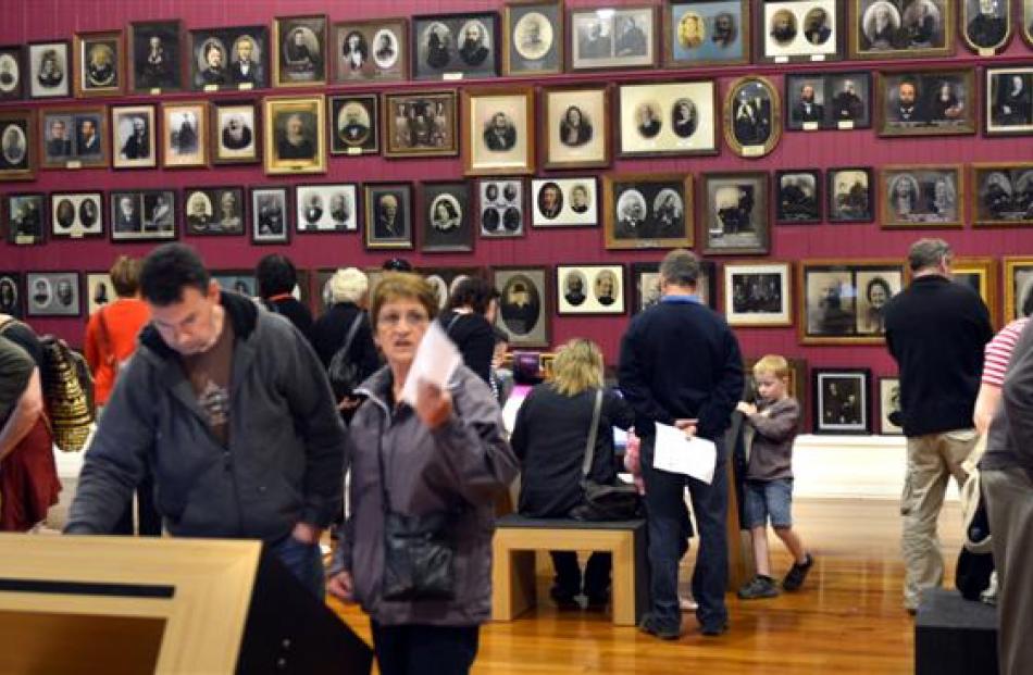 Visitors peruse the Smith Gallery at  Toitu Otago Settlers Museum.