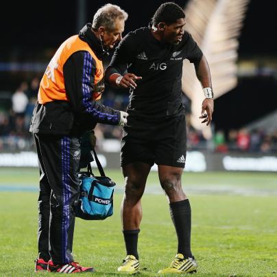 Waisake Naholo of the New Zealand All Blacks receives medical attention during The Rugby...