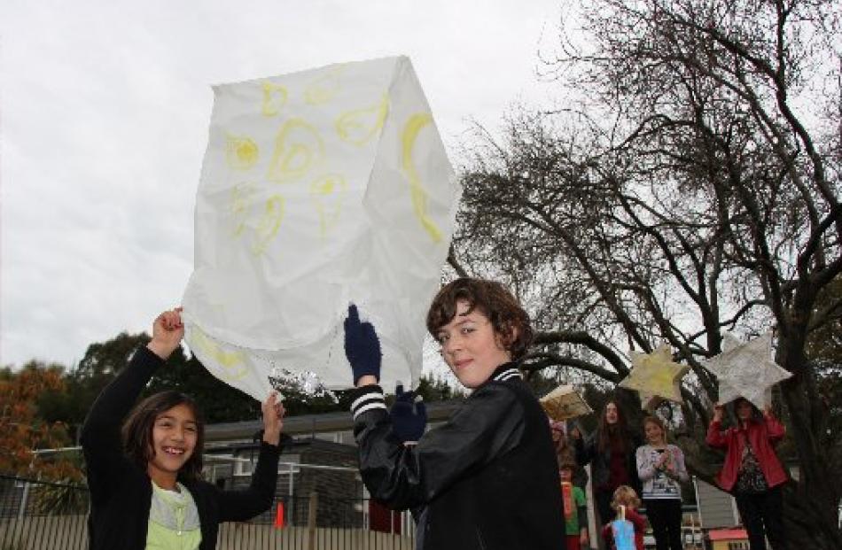Waitiati School pupils Leilani Baeumer (10, left) and Eamon 
...