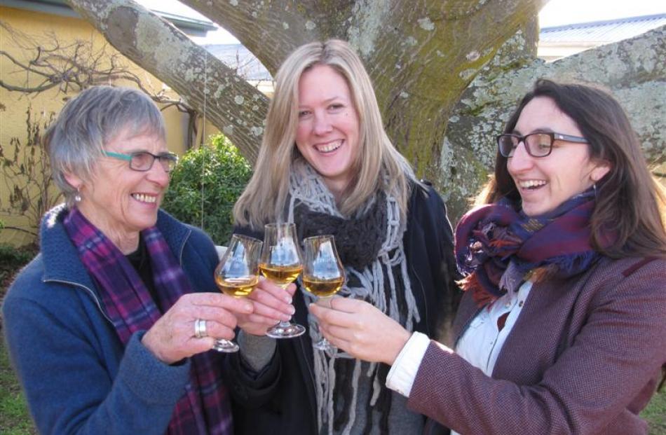 Wanaka woman Desiree Reid (centre) celebrates getting resource consent approval for her proposed...