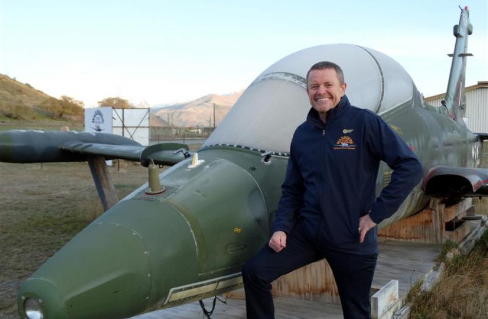 Warbirds Over Wanaka general manager Ed Taylor with the Aermacchi aircraft which is likely to be...