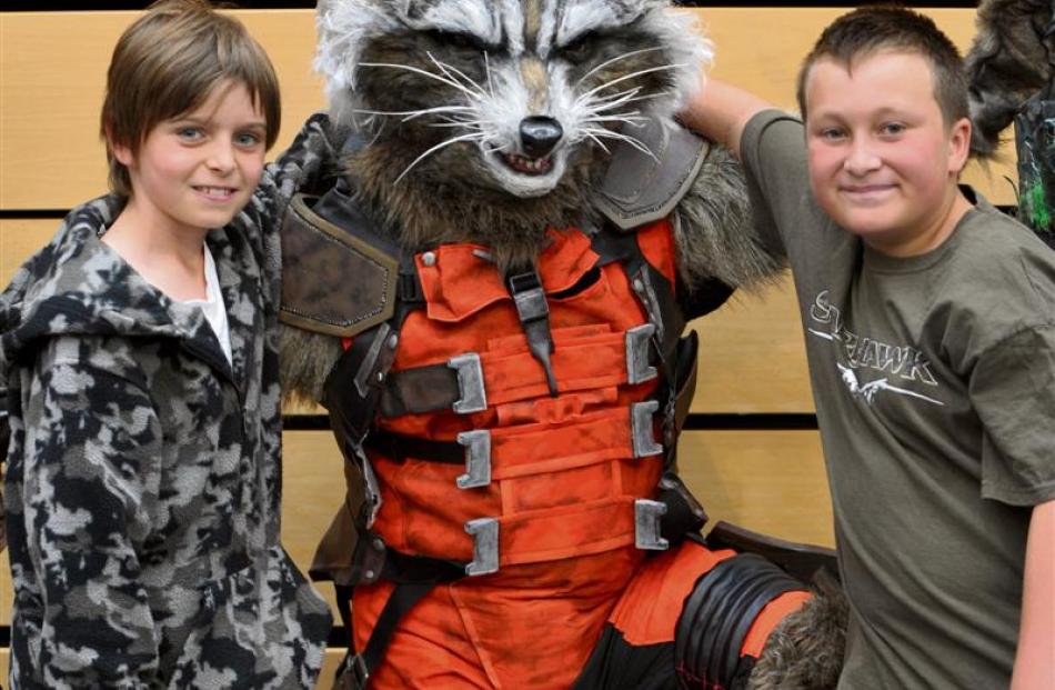 Warren Goodwin as Rocket, from Guardians of the Galaxy , with Rohan Anakin (10, left) and Zed...