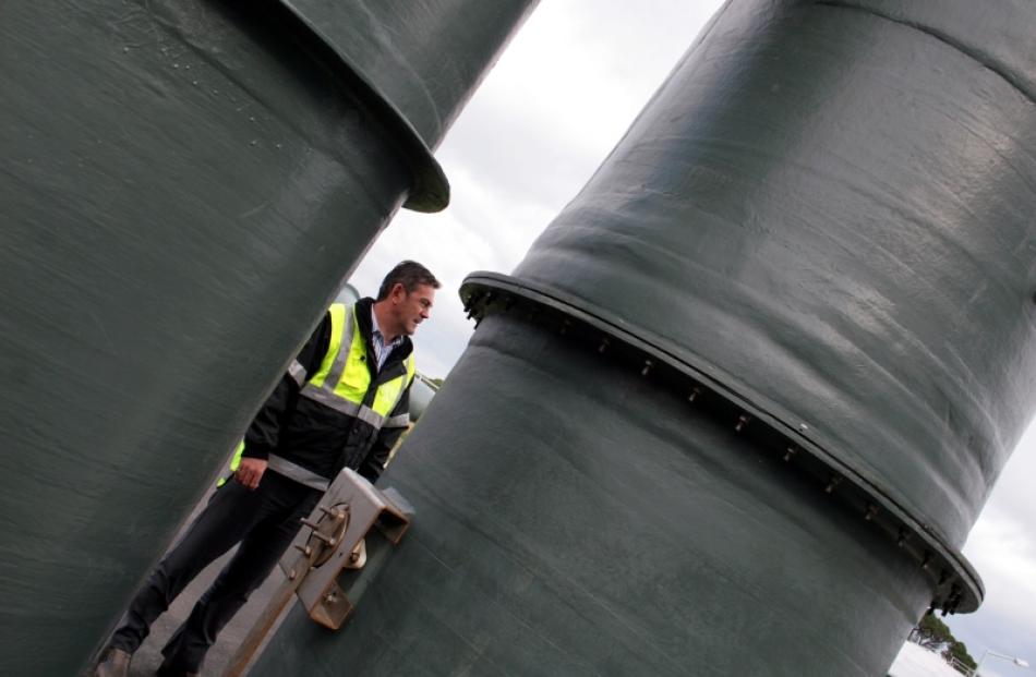 Wastewater treatment manager Chris Henderson takes a stroll through the recently completed water...