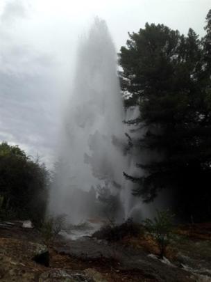 Water from a burst main sprays into the air in Alexandra  yesterday. Photos by Alan McCrostie...