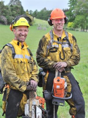 Wenita Forestry contractors Jared Laing (left) and Ken McHoull are covered in soot and dust after...