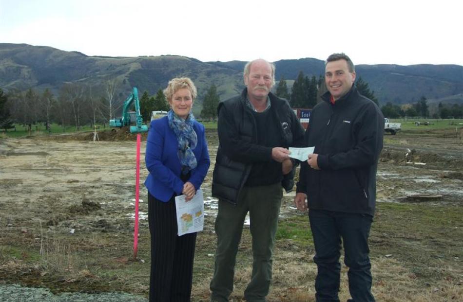 West Otago Health Ltd chairwoman Marianne Parks, West Otago Health Trust member Hans van der...