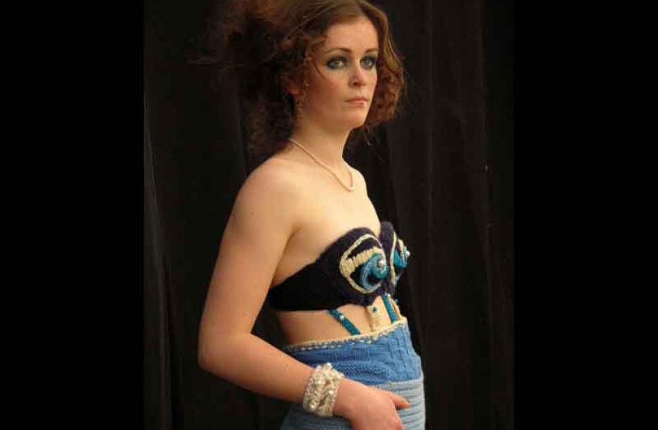 Alexandra model Emily Campbell wears the garment she designed with fellow Alexandra woman Chloe...
