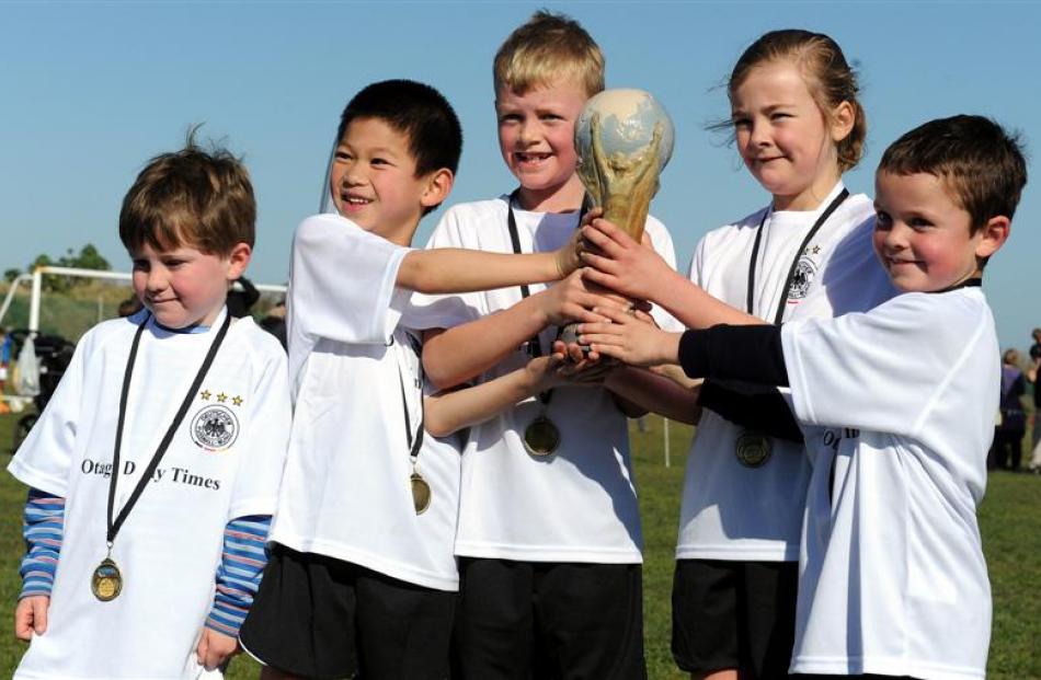World Cup winners (from left) Max Sutherland, Kevin Chen, Harry Hawken, Holly Lightfoot and Ryan...