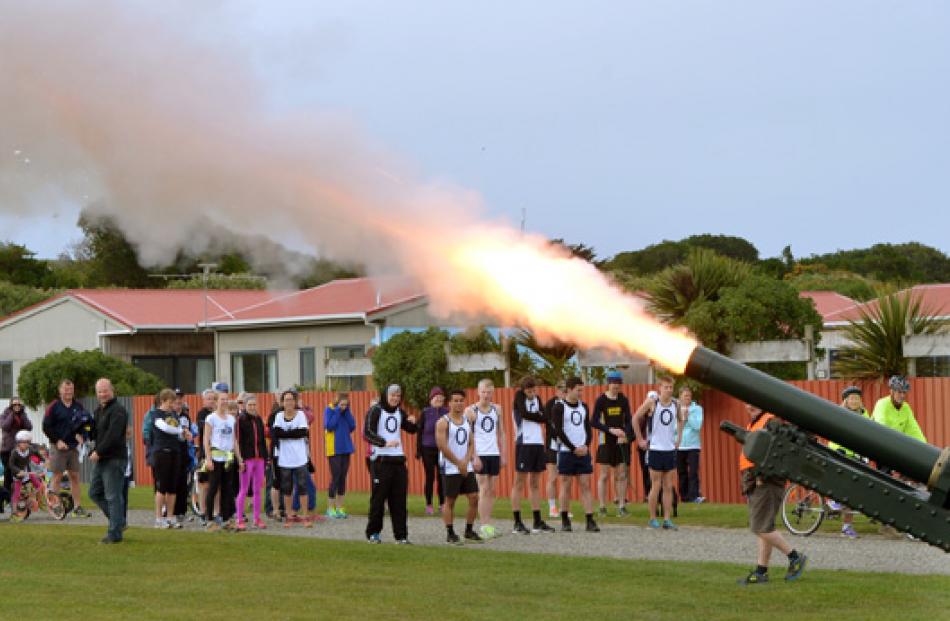 A field gun starts the memorial, cycle, run and walk from Tahuna park to the Oval on Sunday morning.