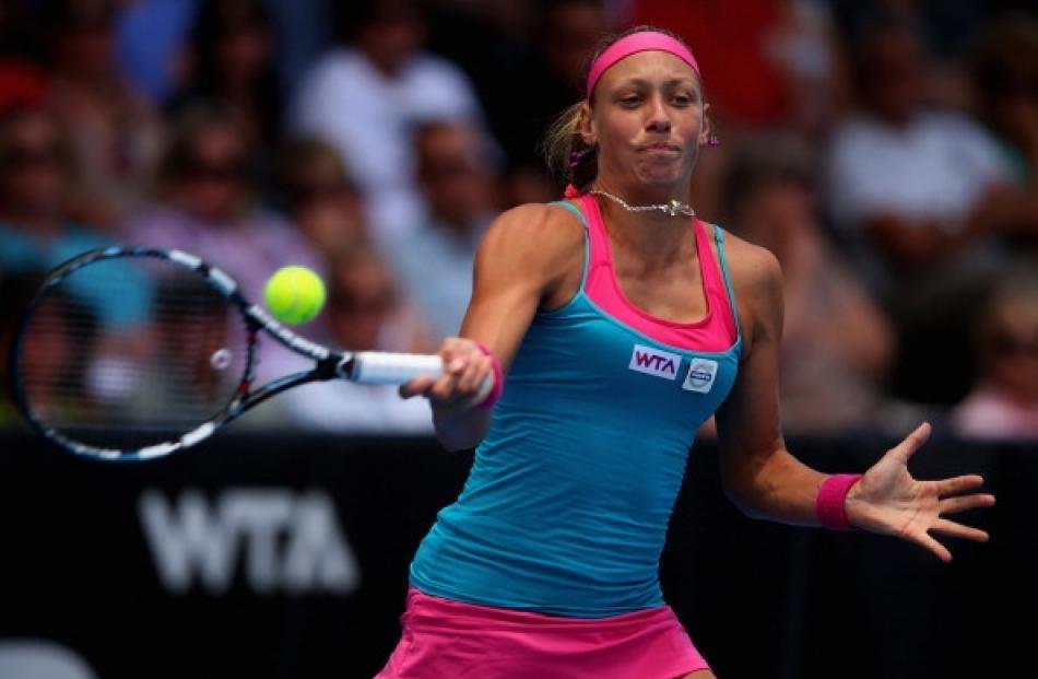 Yanina Wickmayer of Belguim plays a forehand in her semifinal match against Mona Barthel of...