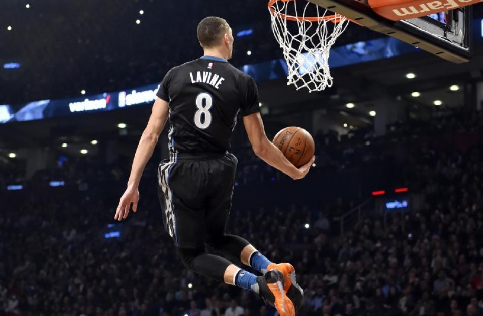 Zach LaVine performs a slam dunk during NBA All-Star Saturday night in Toronto. Photo: Reuters...