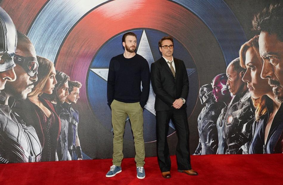 'Captain America: Civil War' stars Chris Evans (L) and Robert Downey Jr. Photo; Getty Images