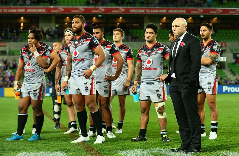 A dejected Andrew McFadden with his team after the match. Photo Getty