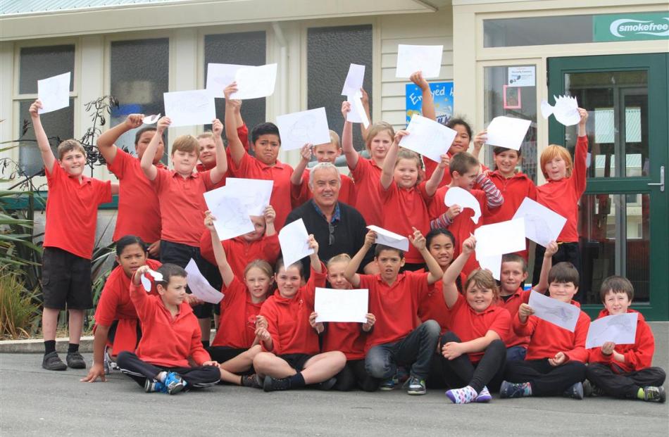 Alexander Bell (centre) says goodbye to his 36-year career as a teacher in North Otago with his...