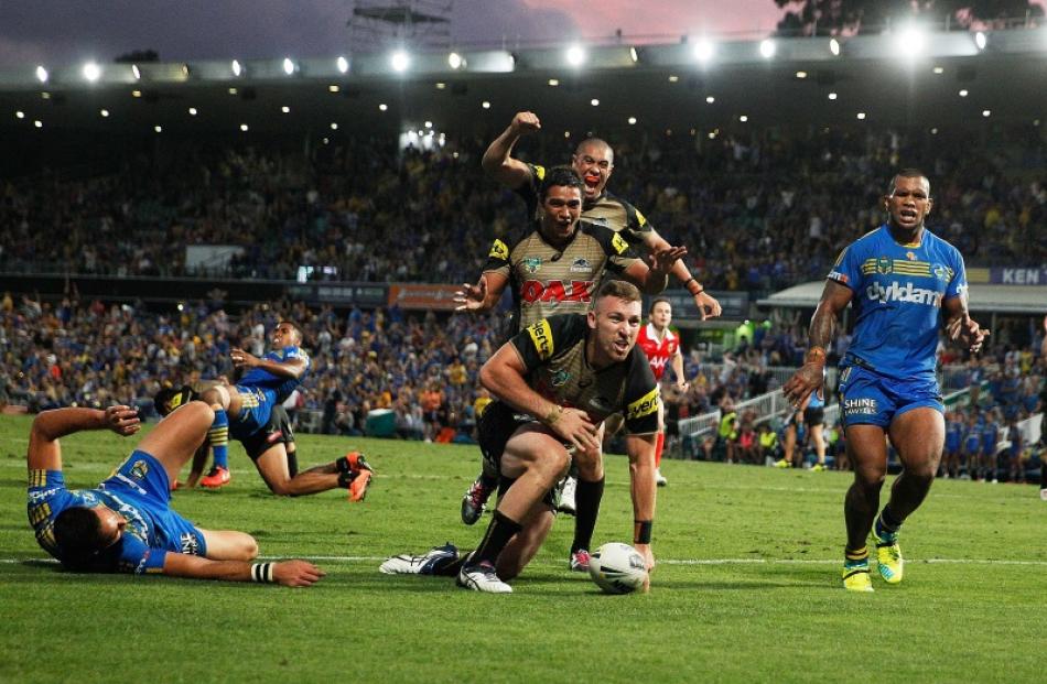 Bryce Cartwright scores the winning try for the Penrith Panthers against the Parramatta Eels....