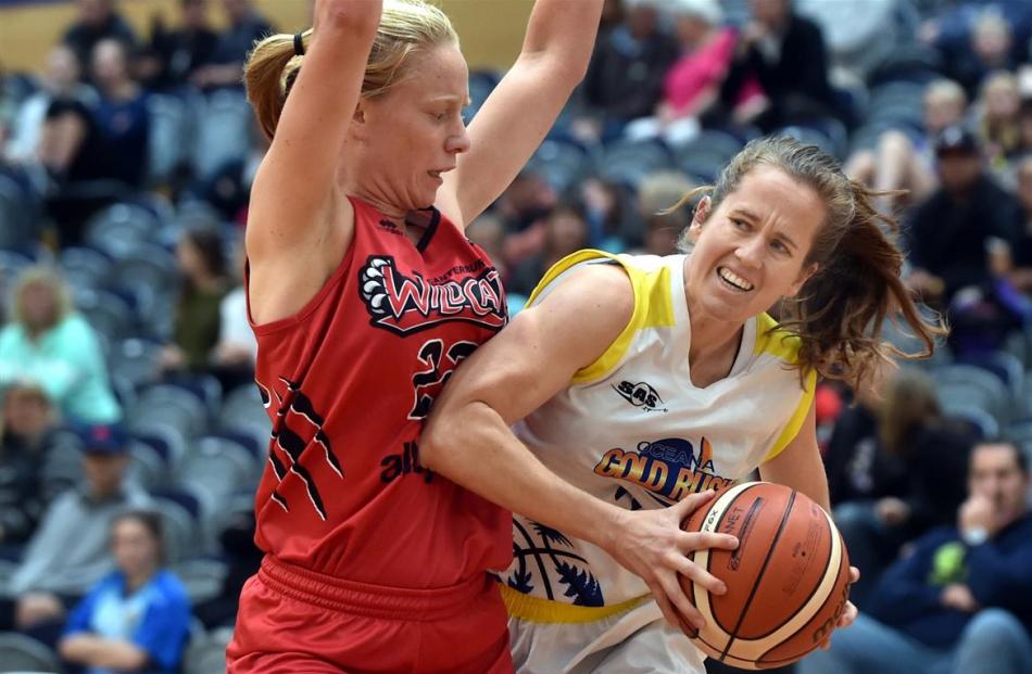 Canterbury Wildcats player Courtney Hamblin blocks  Otago Goldrush’s Danielle Frost during the...