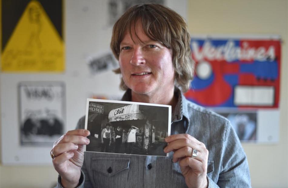 Dr Ian Chapman holds a picture of members of the Verlaines (from left) Steve Cournane, Graeme...