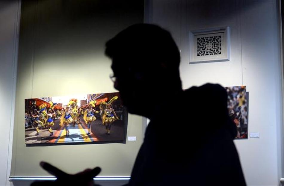Dunedin photographer Carlos Biggemann at his exhibition ‘‘Carnaval de Oruro’’. Photos by Stephen...
