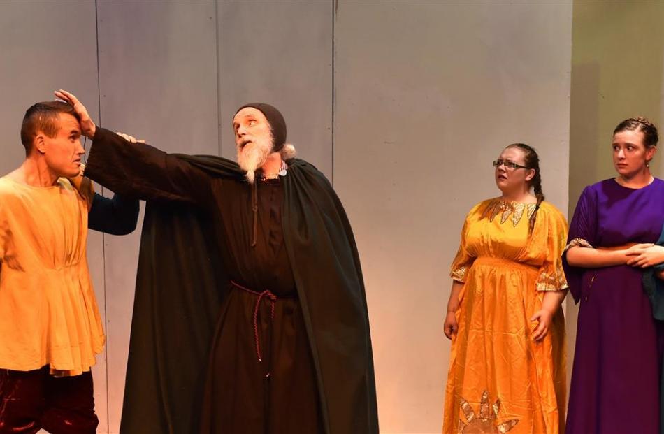 Rehearsing a scene from  The Comedy of Errors’ ‘‘Exorcism’’ are (from left) John Rowe, Jeremy...