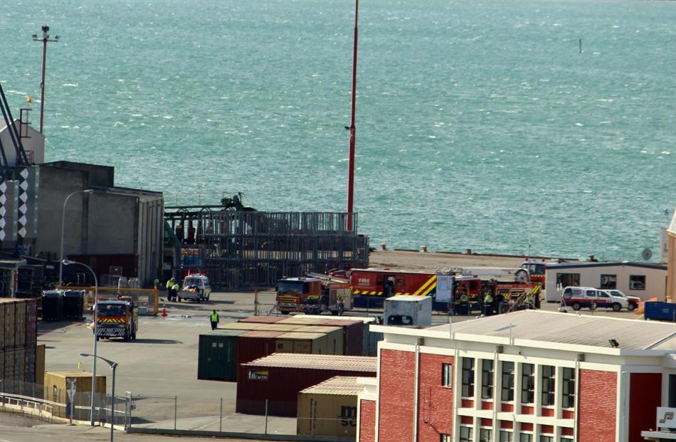 Firefighters contain an ammonia leak at the harbour facility at Bluff yesterday afternoon. Photo...