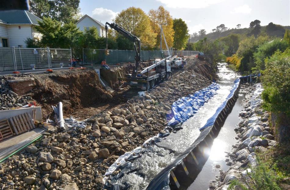 Flood protection work continues in and near the Water of Leith, beside Montgomery Ave, in Dunedin...