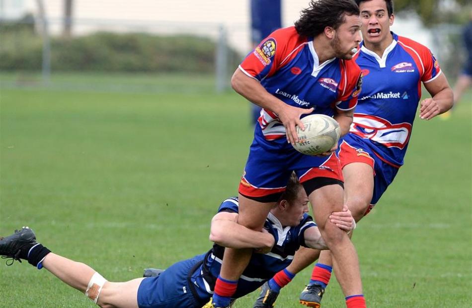 Harbour centre Aleki Morris looks to move the ball on with winger Jerome Harimate in support at...