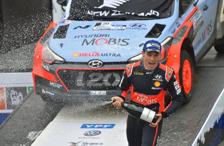 Hayden Paddon celebrates his win in the Rally of Argentina. Photo Getty