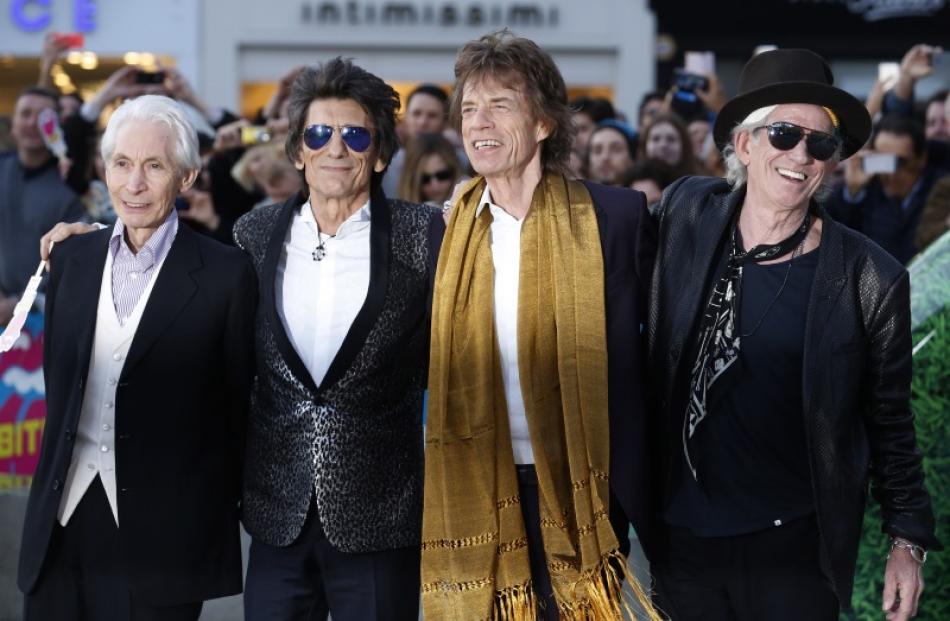 Members of the Rolling Stones, Charlie Watts, Ronnie Wood, Mick Jagger and Keith Richards, arrive...